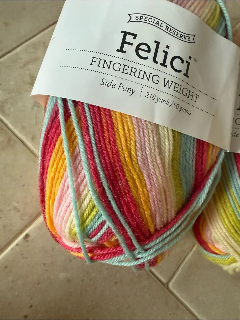 Felici Fingering Weight Yarn - Multicolor Pastel Stripes 2 Skeins Side Pony
